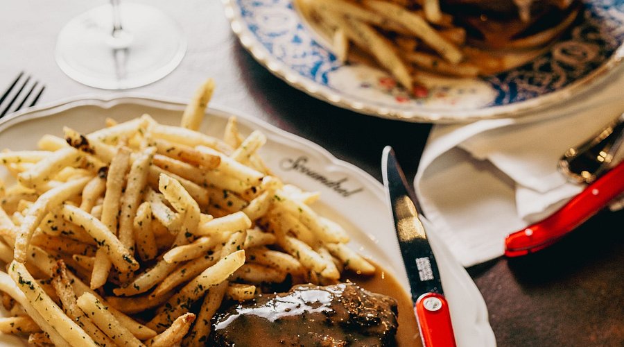 Scoundrel signature dishes Burger a la Française, Steak Frites, French Onion Soup, Escargots